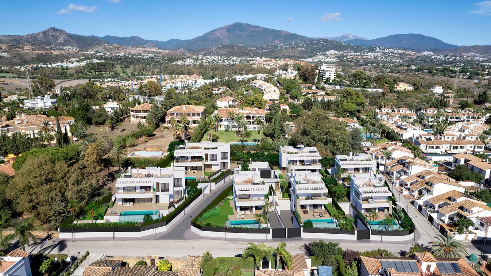 Luchtfoto van moderne villa's met bergzicht